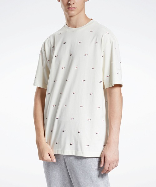 Reebok(リーボック)の「クラシックス オールオーバープリント ニット Tシャツ / Classics Allover Print Knit T-Shirt(Tシャツ/カットソー・メンズ・ブラック/オフホワイト・SMALL/MEDIUM/LARGE/X-LARGE/XX-LARGE/X-SMALL)」の1枚目の写真