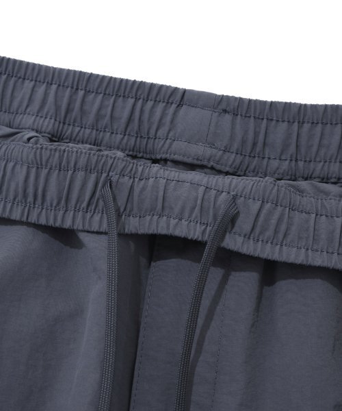 COVERNAT(カバーナット)の「ウィンドブレーカー ジョガーパンツ ネイビー(スウェットパンツ・レディース・その他・SMALL/X-LARGE/XX-LARGE/MEDIUM/LARGE/X-SMALL)」の5枚目の写真