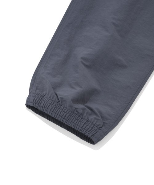 COVERNAT(カバーナット)の「ウィンドブレーカー ジョガーパンツ ネイビー(スウェットパンツ・レディース・その他・SMALL/X-LARGE/XX-LARGE/MEDIUM/LARGE/X-SMALL)」の9枚目の写真