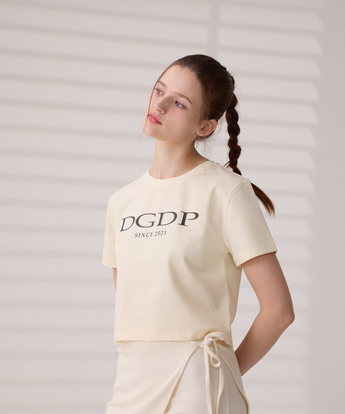 DANGLEDROP(ダングルドロップ)の「DGDPポイントロゴクロップ半袖Tシャツクリーム(Tシャツ/カットソー・レディース・その他・FREE)」の5枚目の写真