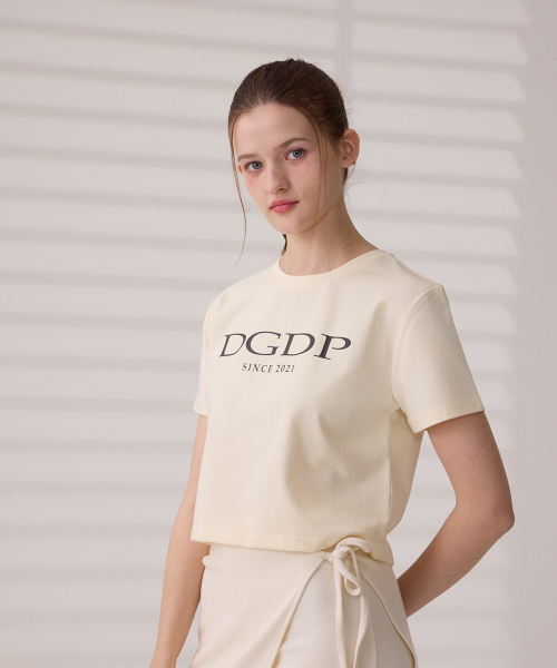 DANGLEDROP(ダングルドロップ)の「DGDPポイントロゴクロップ半袖Tシャツクリーム(Tシャツ/カットソー・レディース・その他・FREE)」の6枚目の写真