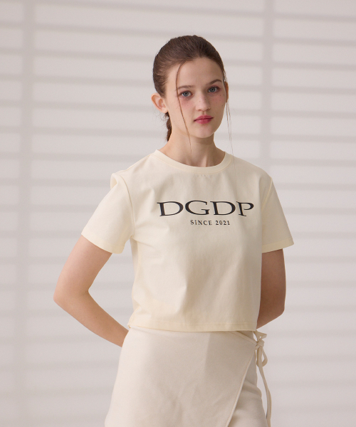 DANGLEDROP(ダングルドロップ)の「DGDPポイントロゴクロップ半袖Tシャツクリーム(Tシャツ/カットソー・レディース・その他・FREE)」の7枚目の写真