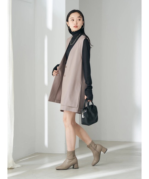 earth music&ecology(アースミュージックアンドエコロジー)の「Vネックミドル丈ジレ(ベスト・レディース・ネイビー/ブラウン・FREE)」の3枚目の写真