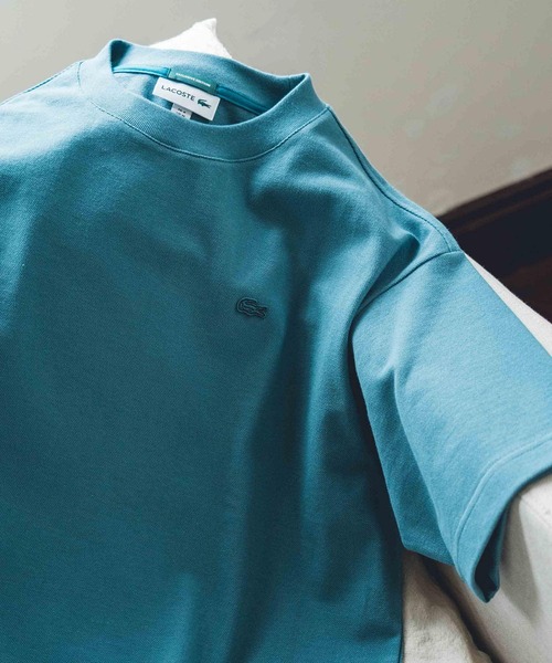 LACOSTE(ラコステ)の「『別注』LACOSTE×DOORS moss stitch Short-Sleeve TEE(Tシャツ/カットソー・メンズ・ブルー/グレー/アイボリー/ベージュ・3/4/5)」の1枚目の写真