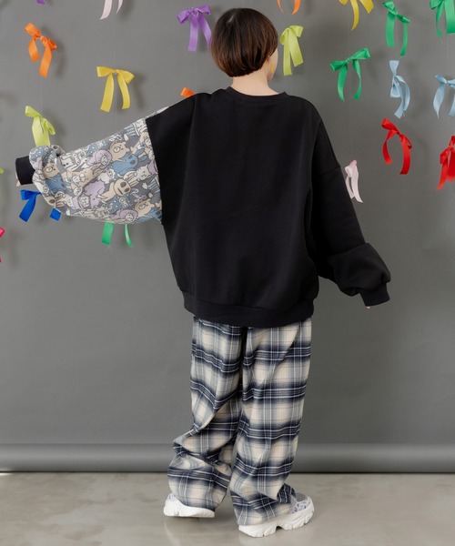 ScoLar Parity(スカラーパリティ)の「353145:Parityキャラ総柄 裏起毛波模様切替プルオーバー(Tシャツ/カットソー・レディース・ブラック/オートミール/ブルー・M)」の9枚目の写真