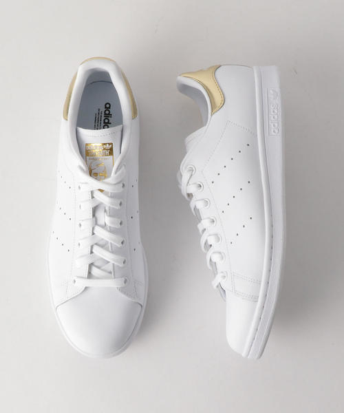 adidas Originals(アディダスオリジナルス)の「<adidas Originals(アディダス)> STAN SMITH GOLD/スタンスミス(スニーカー・メンズ・ホワイト・27cm/25.5cm/26cm/28cm/27.5cm/26.5cm)」の1枚目の写真