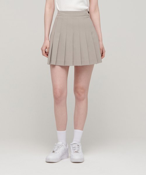 MUSINSA STANDARD WOMAN(ムシンサスタンダードウーマン)の「レディースプリーツミニスカート【ライトベージュ】(スカート・レディース・その他・SMALL/MEDIUM/LARGE/X-SMALL)」の1枚目の写真