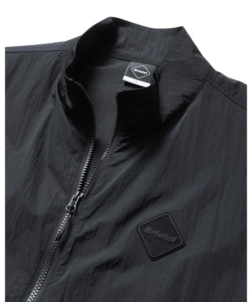 F.C.Real Bristol(エフシーレアルブリストル)の「BIG LOGO NYLON STAND COLLAR BLOUSON(ナイロンジャケット・メンズ・ブルー/オフホワイト/レッド/ブラック・MEDIUM/LARGE/SMALL/X-LARGE/XX-LARGE)」の7枚目の写真