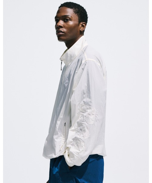 BIG LOGO NYLON STAND COLLAR BLOUSON（ナイロンジャケット）｜F.C.