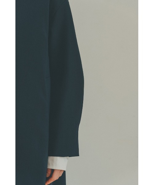 CLANE（クラネ）の「ARCH CUT FLARE COAT（ノーカラーコート・レディース・アイボリー・1/2）」の21枚目の写真