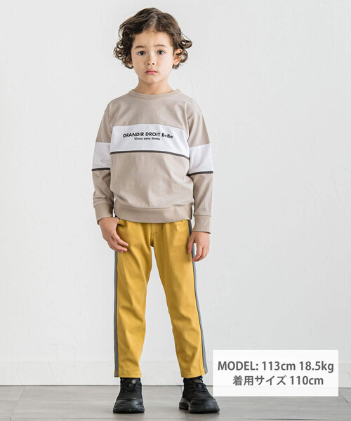 BeBe（ベベ）の「ツイルニットサイドテープロングパンツ(90~150cm)（スウェットパンツ・キッズ・イエロー/ブラック・110cm/120cm/130cm/140cm/150cm/100cm/90cm）」の3枚目の写真