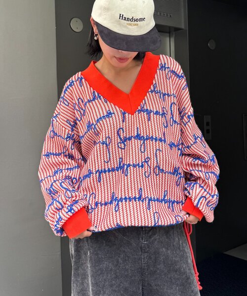 SOUNDSGOOOOD(サウンズグッド)の「【SOUNDS GOOOOD】総柄ロゴ刺繍シアーVニットソー(ニット/セーター・レディース・オレンジ・ONE SIZE)」の3枚目の写真