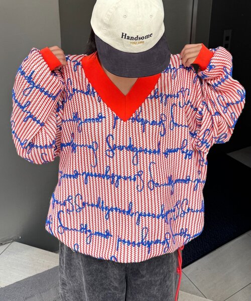 SOUNDSGOOOOD(サウンズグッド)の「【SOUNDS GOOOOD】総柄ロゴ刺繍シアーVニットソー(ニット/セーター・レディース・オレンジ・ONE SIZE)」の7枚目の写真