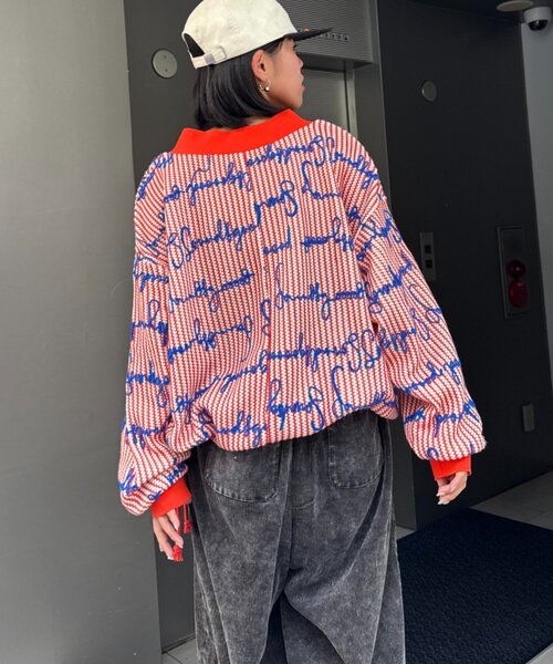 SOUNDSGOOOOD(サウンズグッド)の「【SOUNDS GOOOOD】総柄ロゴ刺繍シアーVニットソー(ニット/セーター・レディース・オレンジ・ONE SIZE)」の9枚目の写真