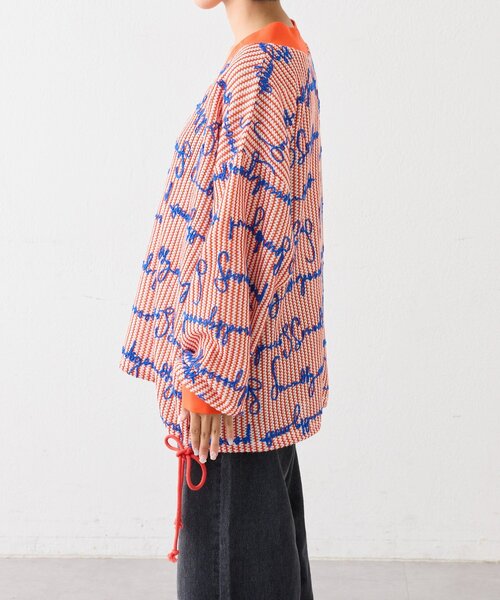 SOUNDSGOOOOD(サウンズグッド)の「【SOUNDS GOOOOD】総柄ロゴ刺繍シアーVニットソー(ニット/セーター・レディース・オレンジ・ONE SIZE)」の11枚目の写真