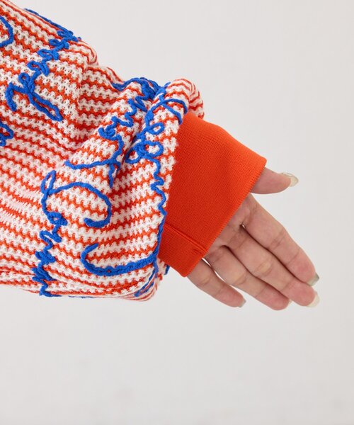 SOUNDSGOOOOD(サウンズグッド)の「【SOUNDS GOOOOD】総柄ロゴ刺繍シアーVニットソー(ニット/セーター・レディース・オレンジ・ONE SIZE)」の12枚目の写真