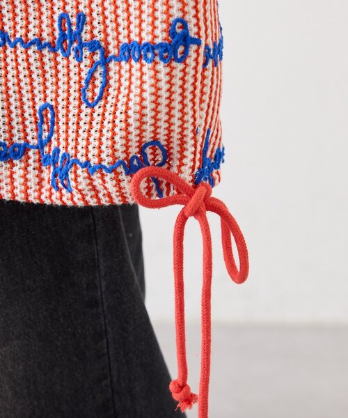 SOUNDSGOOOOD(サウンズグッド)の「【SOUNDS GOOOOD】総柄ロゴ刺繍シアーVニットソー(ニット/セーター・レディース・オレンジ・ONE SIZE)」の15枚目の写真