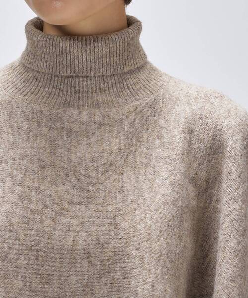 cloenc（クロエンス）の「アシンメトリーニットポンチョ（ニット/セーター・レディース・ベージュ系その他7/チャコール・02）」の5枚目の写真