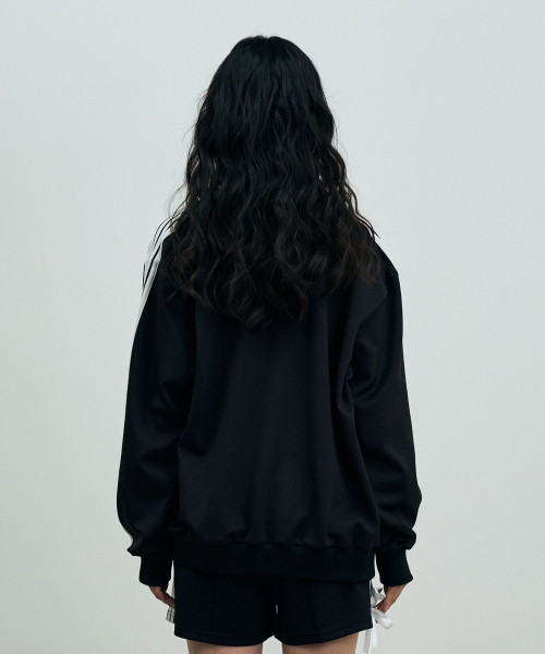 ARI（アリ）の「A RIBBON TRACK TOP / BLACK（ナイロンジャケット・レディース・ブラック・FREE）」の3枚目の写真
