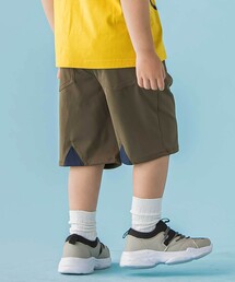 BeBe Petits Pois Vert（ベベプチポワヴェール）の「【店舗限定】バック三角ポイント切替ショートパンツ(95～150cm)（その他パンツ）」