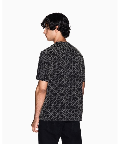 ARMANI EXCHANGE(アルマーニエクスチェンジ)の「【A|X アルマーニ エクスチェンジ】オールオーバーロゴ 半袖クルーネックTシャツ/REGULAR+(Tシャツ/カットソー・メンズ・ブラック・MEDIUM/X-LARGE/X-SMALL/XX-LARGE/SMALL/LARGE)」の2枚目の写真