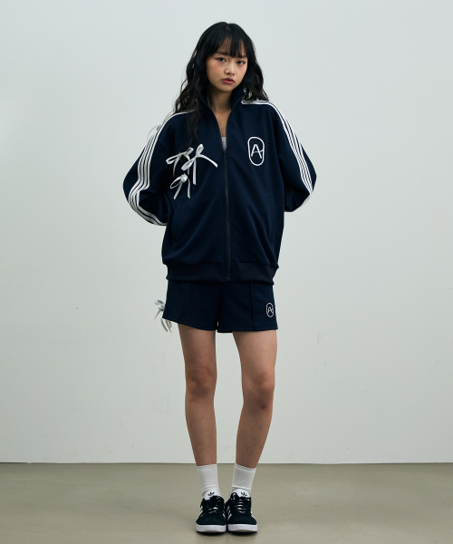 ARI(アリ)の「A RIBBON TRACK TOP / NAVY(ナイロンジャケット・レディース・ネイビー・FREE)」の17枚目の写真