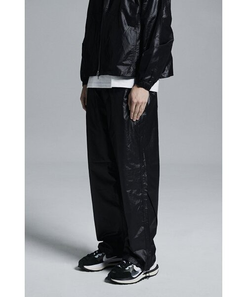 APOSTROPHE COMMA(アポストロフィコンマ)の「ハイグロシーストリングナイロンワイドパンツ(ブラック)(スウェットパンツ・メンズ・その他・SMALL/LARGE/MEDIUM)」の1枚目の写真