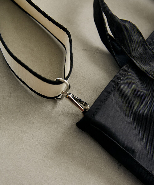 OUTDOOR PRODUCTS（アウトドアプロダクツ）の「OUTDOOR PRODUCTS/アウトドアプロダクツ ストライプ テープ 2WAY トートバッグ　限定展開（トートバッグ・レディース・その他9/ブラック・ONE SIZE）」の13枚目の写真