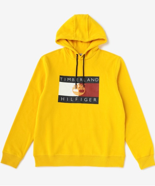 TOMMY HILFIGER（トミーヒルフィガー）の「THxTimberland フラッグパーカー（ベスト・メンズ・ネイビー/イエロー・SMALL/MEDIUM/LARGE/X-LARGE/XX-LARGE/X-SMALL）」の2枚目の写真