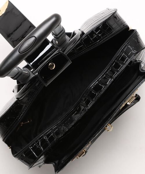 Three Four Time（ｽﾘｰﾌｫｰﾀｲﾑ）の「4輪型押しレトロキャリーBAG　＠（スーツケース/キャリーバッグ・レディース・ブラック・FREE）」の4枚目の写真