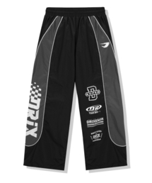 DRIX（ドリックス）の「配色パイピングレーシングパンツ_ブラック（スウェットパンツ）」