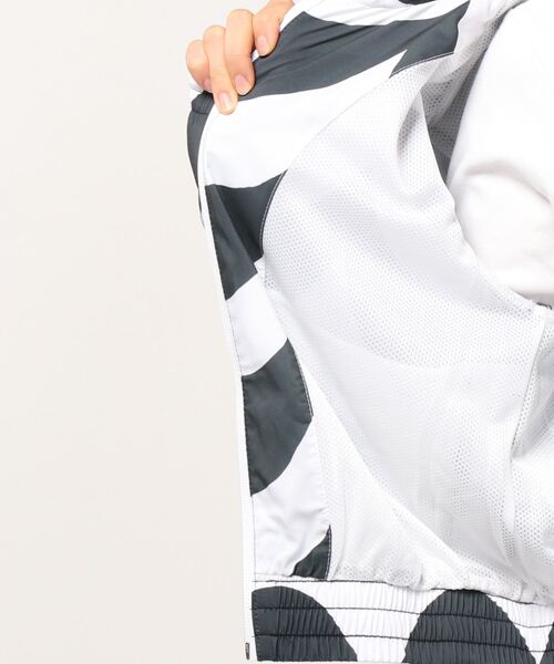 adidas(アディダス)の「マリメッコ ウーブン トラックジャケット / アディダスオリジナルス(ナイロンジャケット・レディース・ブラック×ホワイト/レッド・MEDIUM/SMALL/X-SMALL/LARGE/X-LARGE/XX-LARGE)」の10枚目の写真