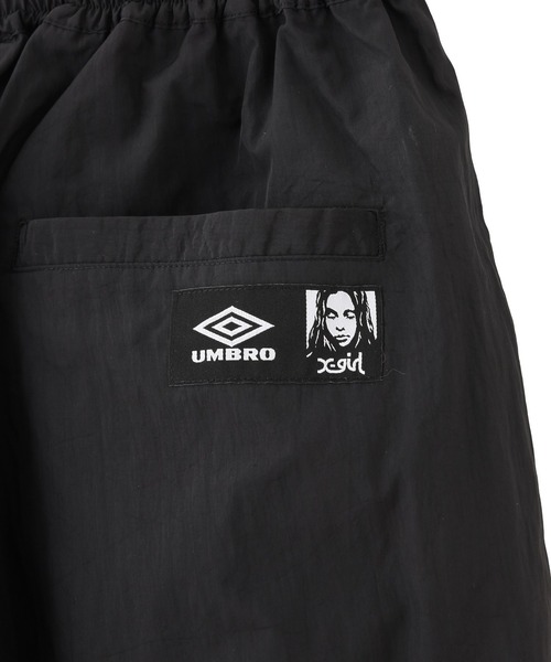UMBRO（アンブロ）の「X-girl x UMBRO WIDE LEG TRACK PANTS（その他パンツ・レディース・ブラック/ネイビー・M/S）」の10枚目の写真