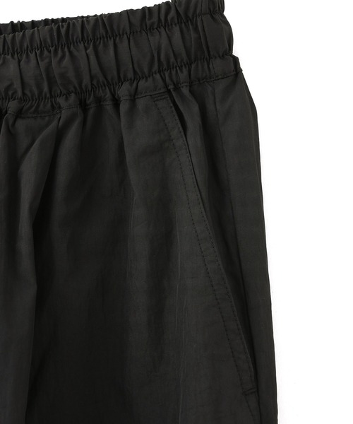 UMBRO（アンブロ）の「X-girl x UMBRO WIDE LEG TRACK PANTS（その他パンツ・レディース・ブラック/ネイビー・M/S）」の6枚目の写真