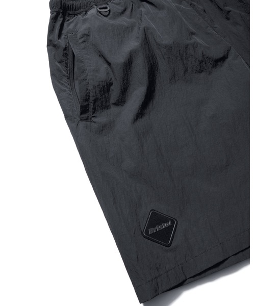 F.C.Real Bristol(エフシーレアルブリストル)の「BIG LOGO NYLON EASY SHORTS(その他パンツ・メンズ・ブラック/ブルー/レッド/オフホワイト・XX-LARGE/X-LARGE/LARGE/MEDIUM/SMALL)」の9枚目の写真