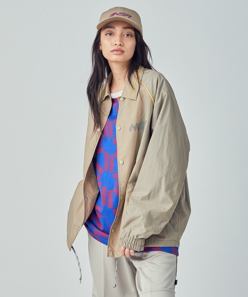 Not So Ape（ノットソーエイプ）の「Not so Apeコーチジャケット（ナイロンジャケット・メンズ・ベージュ/イエロー・MEDIUM/LARGE）」の2枚目の写真