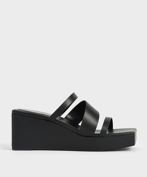 CHARLES & KEITH(チャールズ & キース)の「アシンメトリック プラットフォームウェッジ / Asymmetric Platform Wedges(サンダル・レディース・ホワイト/ブラック/ライトベージュ・22.5cm/23cm/23.5cm/24.5cm/25cm/25.5cm)」の2枚目の写真
