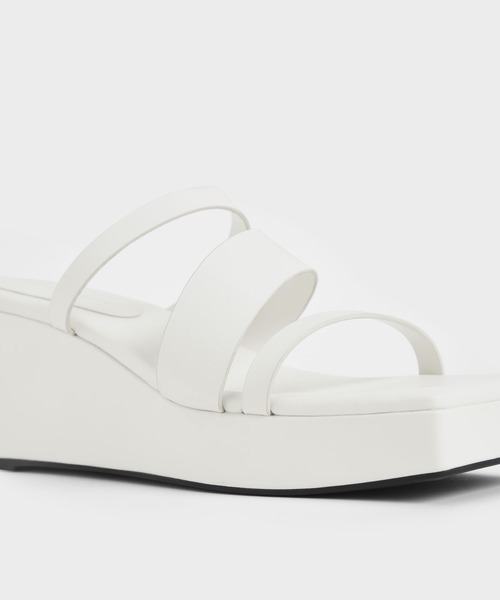 CHARLES & KEITH(チャールズ & キース)の「アシンメトリック プラットフォームウェッジ / Asymmetric Platform Wedges(サンダル・レディース・ホワイト/ブラック/ライトベージュ・22.5cm/23cm/23.5cm/24.5cm/25cm/25.5cm)」の20枚目の写真