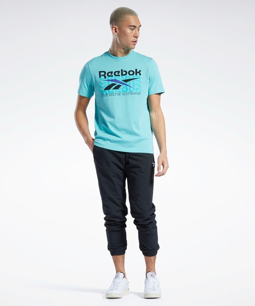 Reebok(リーボック)の「グラフィック シリーズ インターナショナル スポーツウェア Tシャツ / Graphic Series International Sportswear T-Shirt(Tシャツ/カットソー・メンズ・ブルー/ホワイト・LARGE/XX-LARGE/X-SMALL/MEDIUM/X-LARGE/SMALL/XXX-LARGE/J/L/J/S)」の7枚目の写真