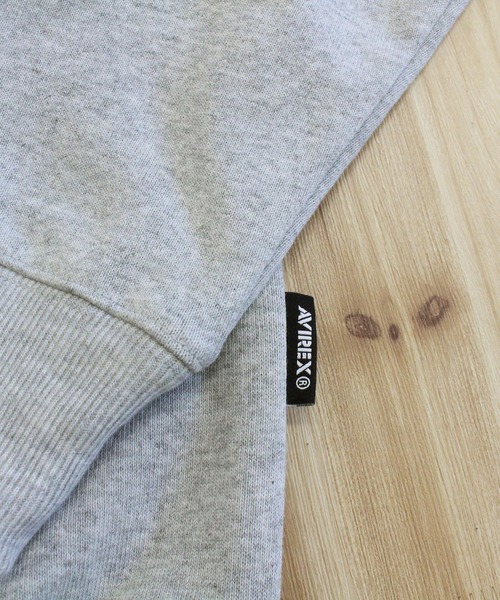 AVIREX(アヴィレックス)の「2026リニューアル SIGNATURE VARSITY LOGO ZIP UP PARKA(パーカー・メンズ・カーキ/ライトグレー/ブラック/オリーブ・XXL/XL/L/M)」の15枚目の写真