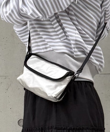 TAB N SHIFT（タブアンドシフト）の「Joy Eyewear Cross Bag - Silver（メッセンジャーバッグ）」