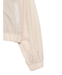 anuans（アニュアンス）の「ボリュームスリーブシアーブルゾン