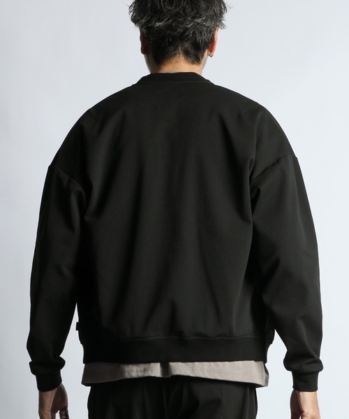 The DUFFER of ST.GEORGE（ザダファーオブセントジョージ）の「[360° THE CIRCLE STRETCH] BY WONDER SHAPE：セットアップ対応 サークルストレッチ MA-1 / フライトジャケット / ワンダーシェイプ / 軽量アウター / ボンバージャケット（MA-1・メンズ・ネイビー/ブラック・X-LARGE/LARGE/MEDIUM/SMALL）」の8枚目の写真