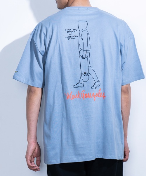 Mark Gonzales(マーク・ゴンザレス)の「Mark Gonzales/マークゴンザレス 別注オーバーサイズ グラフィックプリントTシャツ(Tシャツ/カットソー・メンズ・ホワイト/ベージュ/ブラック/グリーン/グレイッシュブルー/ベージュ系その他/ブラック系その他/グリーン系その他/ブルー系その他/ホワイト系その他/ベージュ系その他2/ブラック系その他2/グリーン系その他2/ブルー系その他2/ホワイト系その他2/ベージュ系その他3/ブラック系その他3/グリーン系その他3/ブルー系その他3/ホワイト系その他3・M/L/XL)」の1枚目の写真