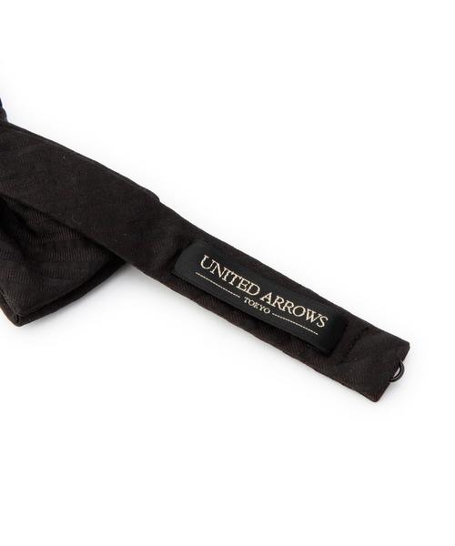 UNITED ARROWS(ユナイテッドアローズ)の「UA ジャカードサッカー ボウタイ(蝶ネクタイ・メンズ・オフホワイト/ブラック/ターコイズブルー/ネイビー・フリー)」の6枚目の写真