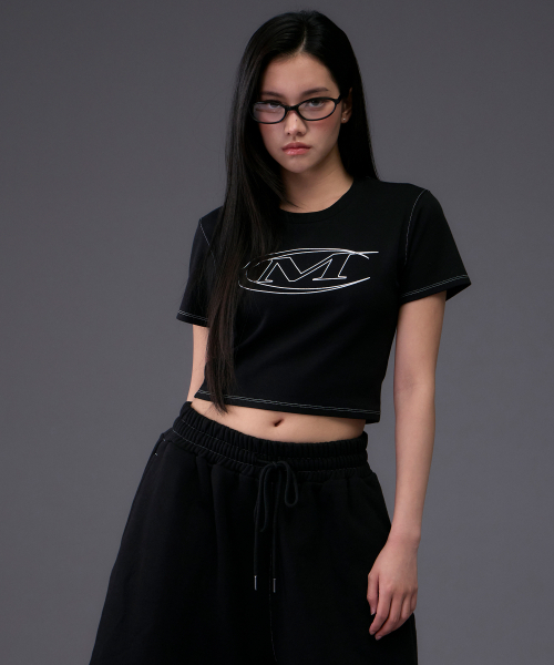 MIHAK(ミハク)の「ストロークロゴステッチクロップTシャツ (ブラック)(Tシャツ/カットソー・レディース・その他・1/2)」の1枚目の写真