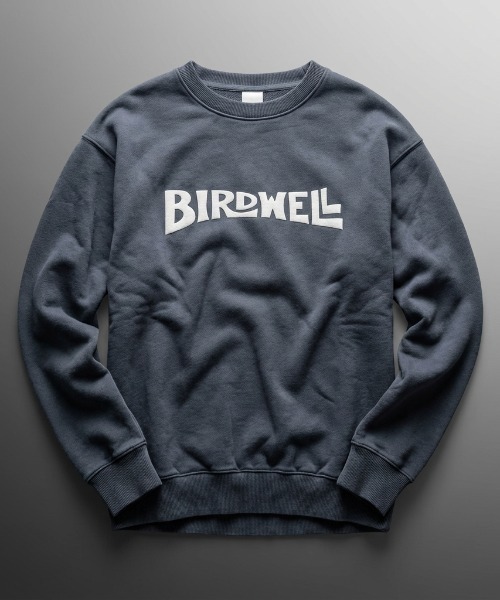 BIRDWELL(バードウェル)の「【BIRDWELL/バードウェル】WORDMARK PGM SWEATSHIRT-JP 日本別注 ピグメント加工 ブランドロゴ スウェット トレーナー(スウェット・メンズ・グレー/ブルー・SMALL/MEDIUM/LARGE/X-LARGE)」の1枚目の写真