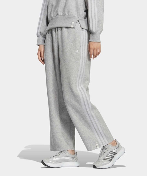 adidas(アディダス)の「エッセンシャルズ プラス スリーストライプ スペーサーニット ルーズフィット ストレート オープンヘム ジョガーパンツ / アディダス adidas(その他パンツ・レディース・グレー・X-LARGE/X-SMALL/XX-LARGE/LARGE/SMALL/MEDIUM)」の1枚目の写真