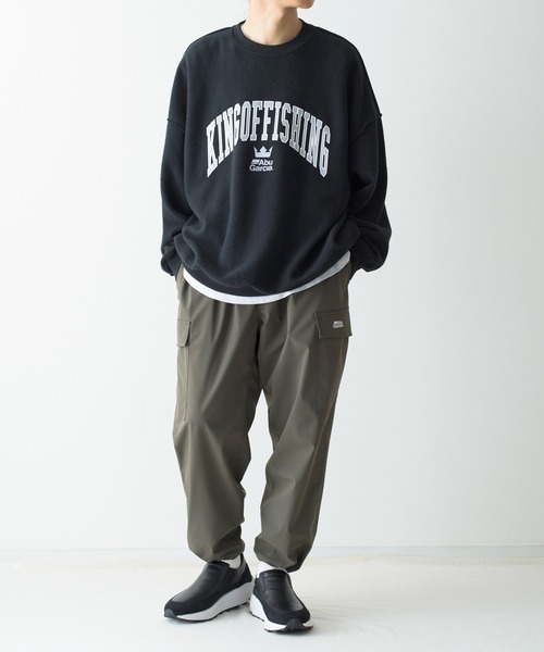 And A（アンドエー）の「Abu Garcia アブガルシア / × is-ness BIG REVERSIBLE SWEAT イズネスコラボ リバーシブル カレッジロゴ ビッグスウェット アーチロゴトレーナー / 21AAB-2001（スウェット・メンズ・ブラック/オリーブ・LARGE/X-LARGE/MEDIUM）」の19枚目の写真