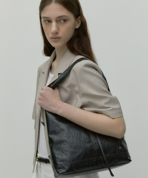 depound(デパウンド)の「pino bag (hobo) M(ショルダーバッグ・レディース・ブラック/アイボリー・FREE)」の3枚目の写真